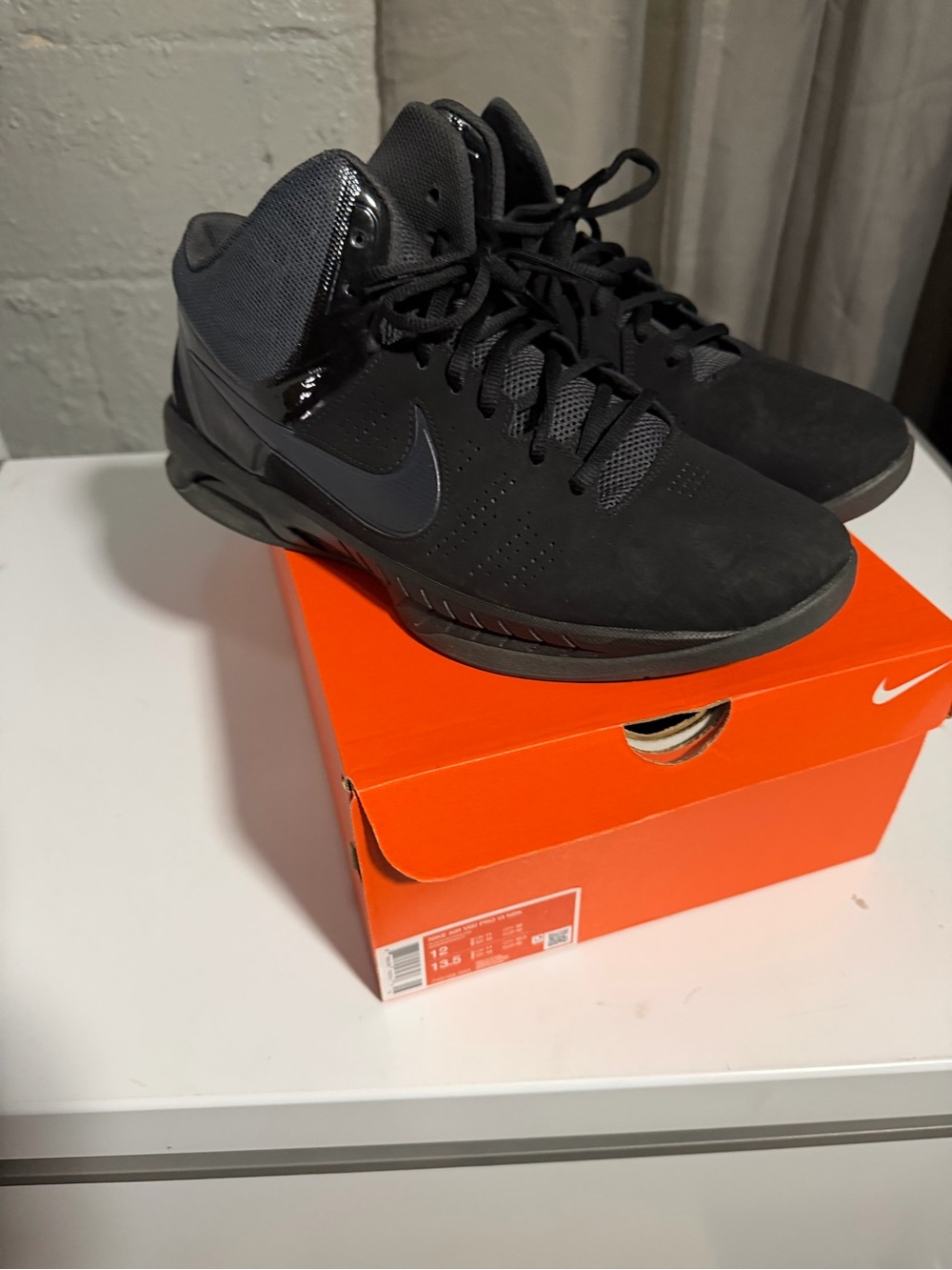 Nike Black Mid-Top Sneakers with Subtle Grey Accents